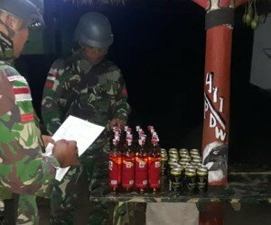 Amankan Puluhan Botol Miras-(ist)