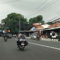 Kondisi badan Jl. Raya KSU Kalimulya yang sudah baik setelah diperbaiki dengan dana sebesar Rp 17 miliar dari Propinsi Jabar. (anton)