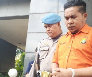 Salah satu pelaku penyiraman air keras ke Novel Baswedan yang dibawa ke Bareskrim Mabes Polri, Sabtu (28/12/2019). (firda)